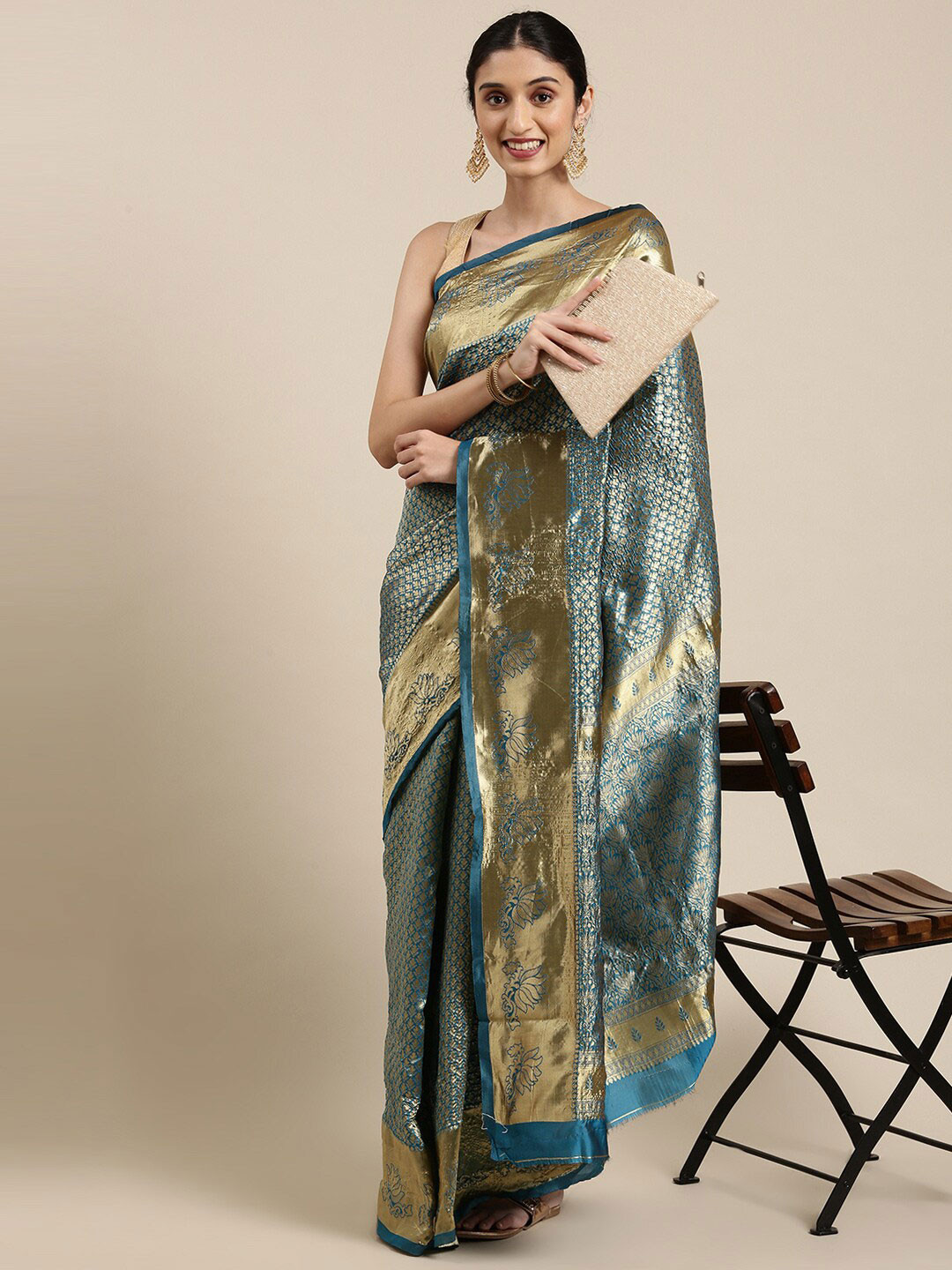 

The Chennai Silks Blue & Gold-Toned Floral Zari Silk Blend Patola Saree