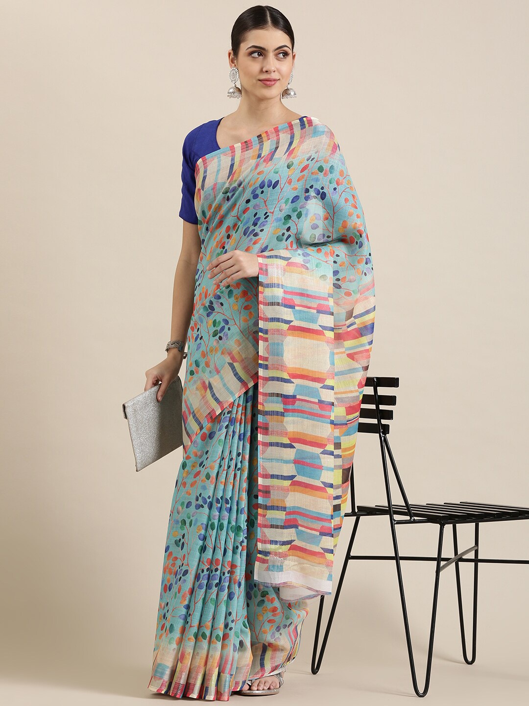 

The Chennai Silks Blue & Orange Floral Linen Blend Saree