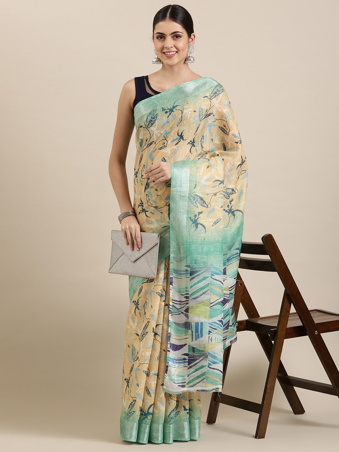 

The Chennai Silks Yellow & White Floral Zari Linen Blend Fusion Saree