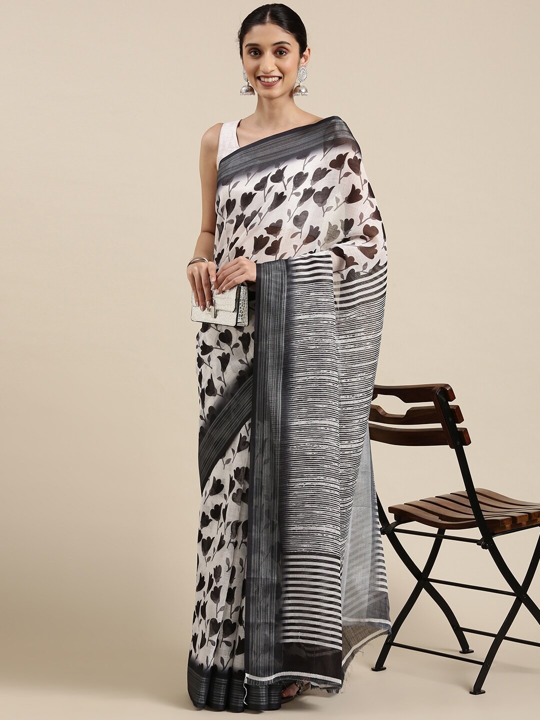 

The Chennai Silks White & Grey Floral Zari Linen Blend Fusion Saree