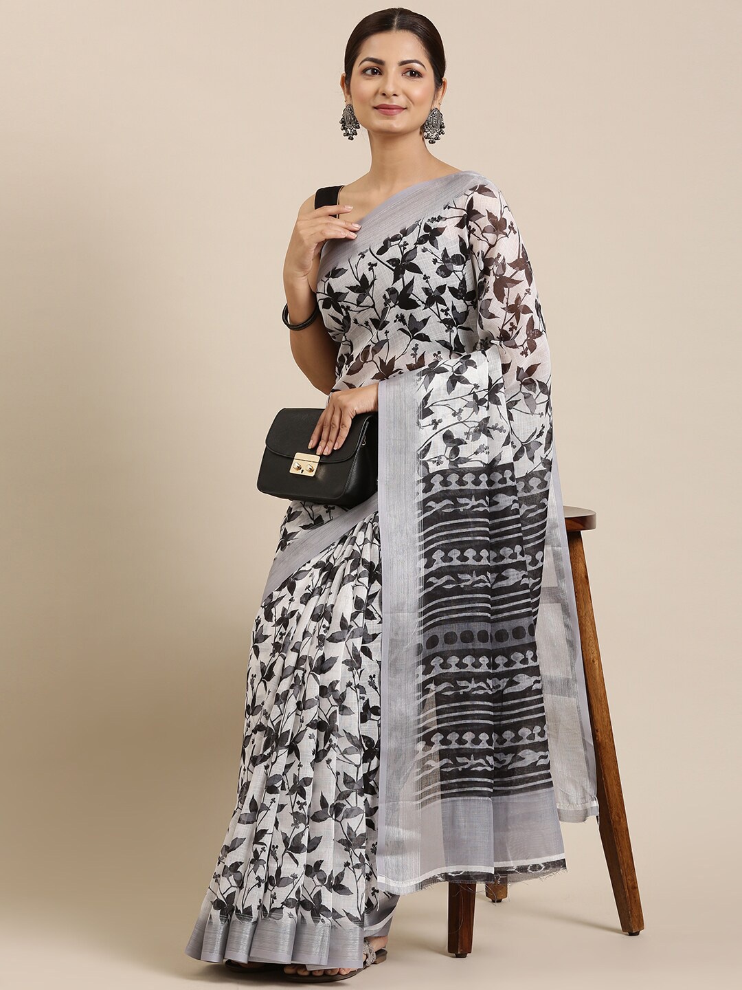 

The Chennai Silks White & Grey Floral Linen Blend Saree
