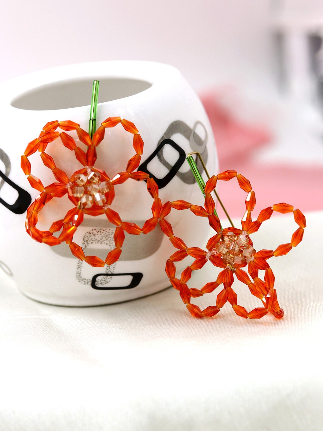 

Bellofox Women Orange & Green Floral Studs Earrings