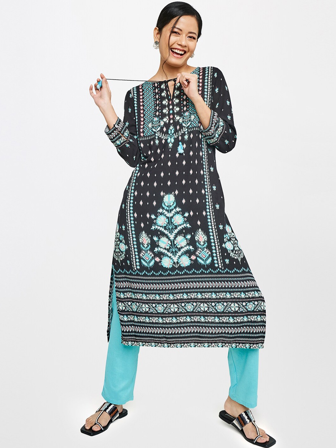 

Global Desi Women Black Ethnic Motifs Printed Keyhole Neck Kurta