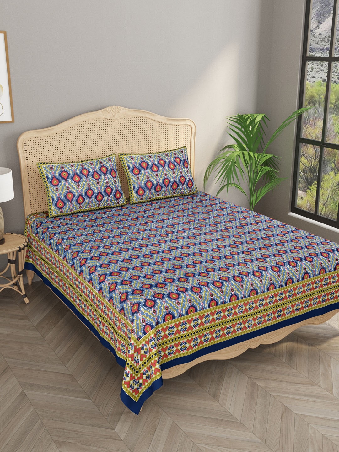 

Gulaab Jaipur Blue & Red Graphic 600 TC King Bedsheet with 2 Pillow Covers