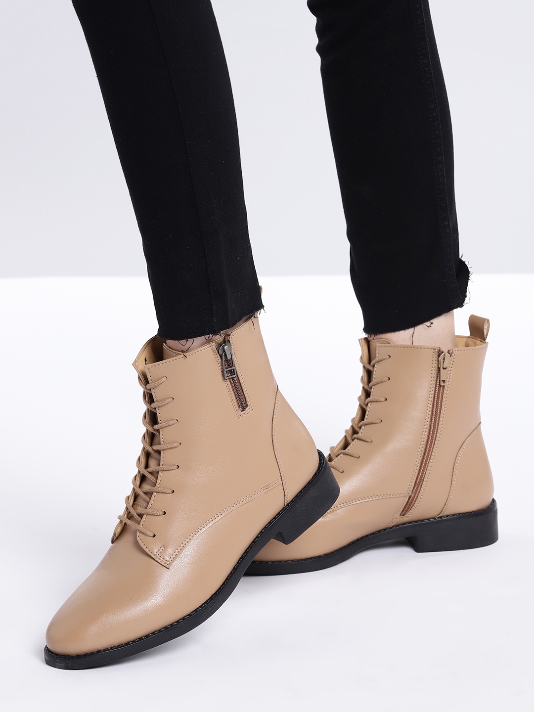 

Roadster Women Beige Solid Mid-Top Regular Boots