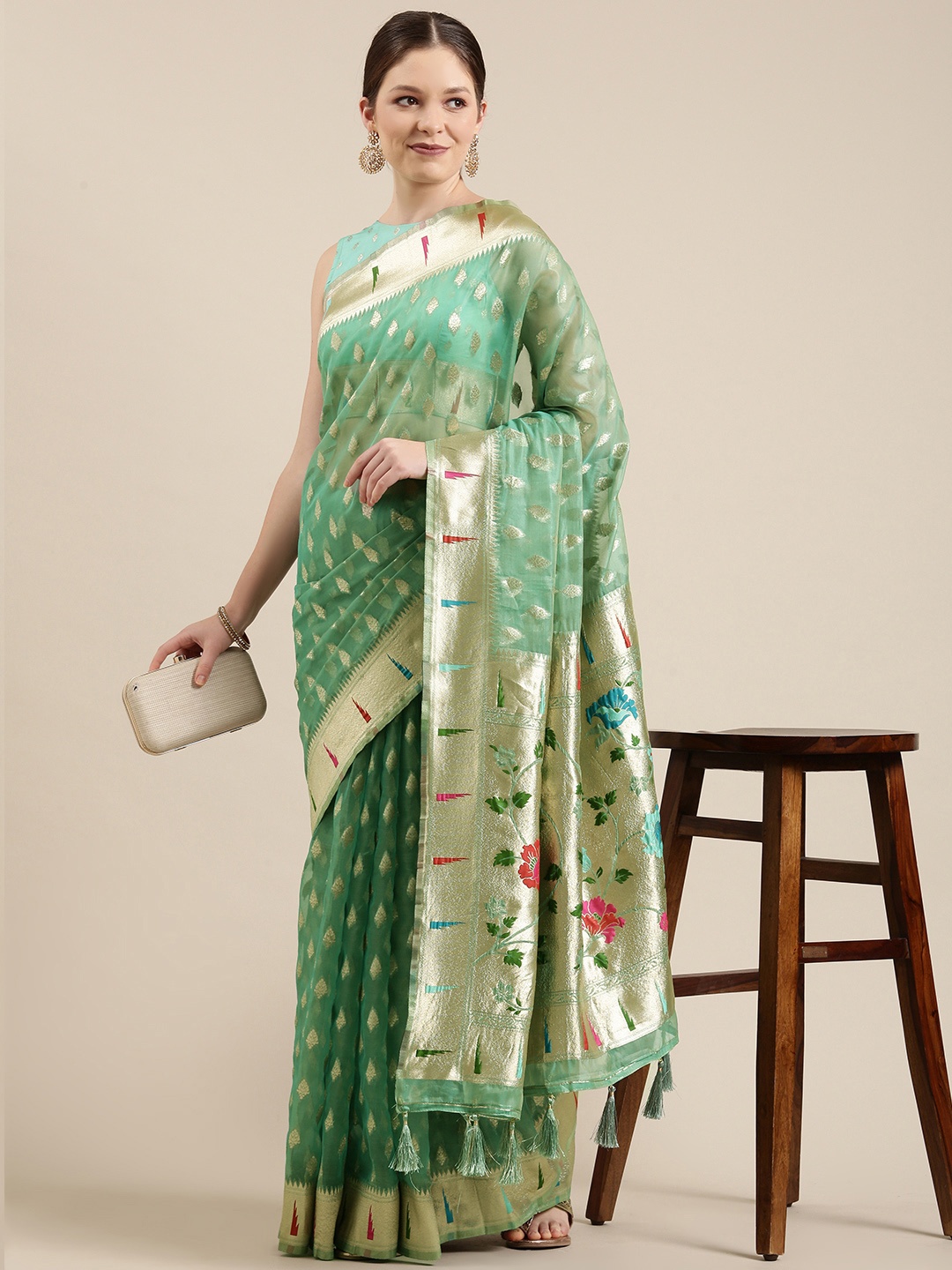 

panchhi Sea Green & Golden Ethnic Motifs Zari Organza Banarasi Saree