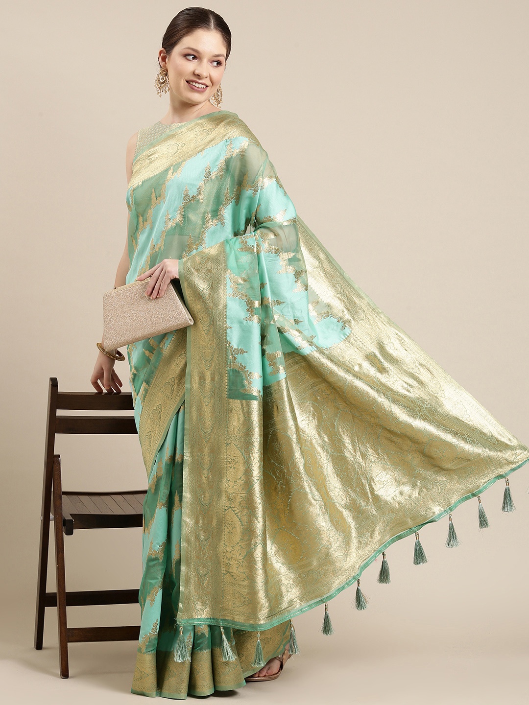 

panchhi Mint Green & Golden Ethnic Motifs Zari Organza Banarasi Saree