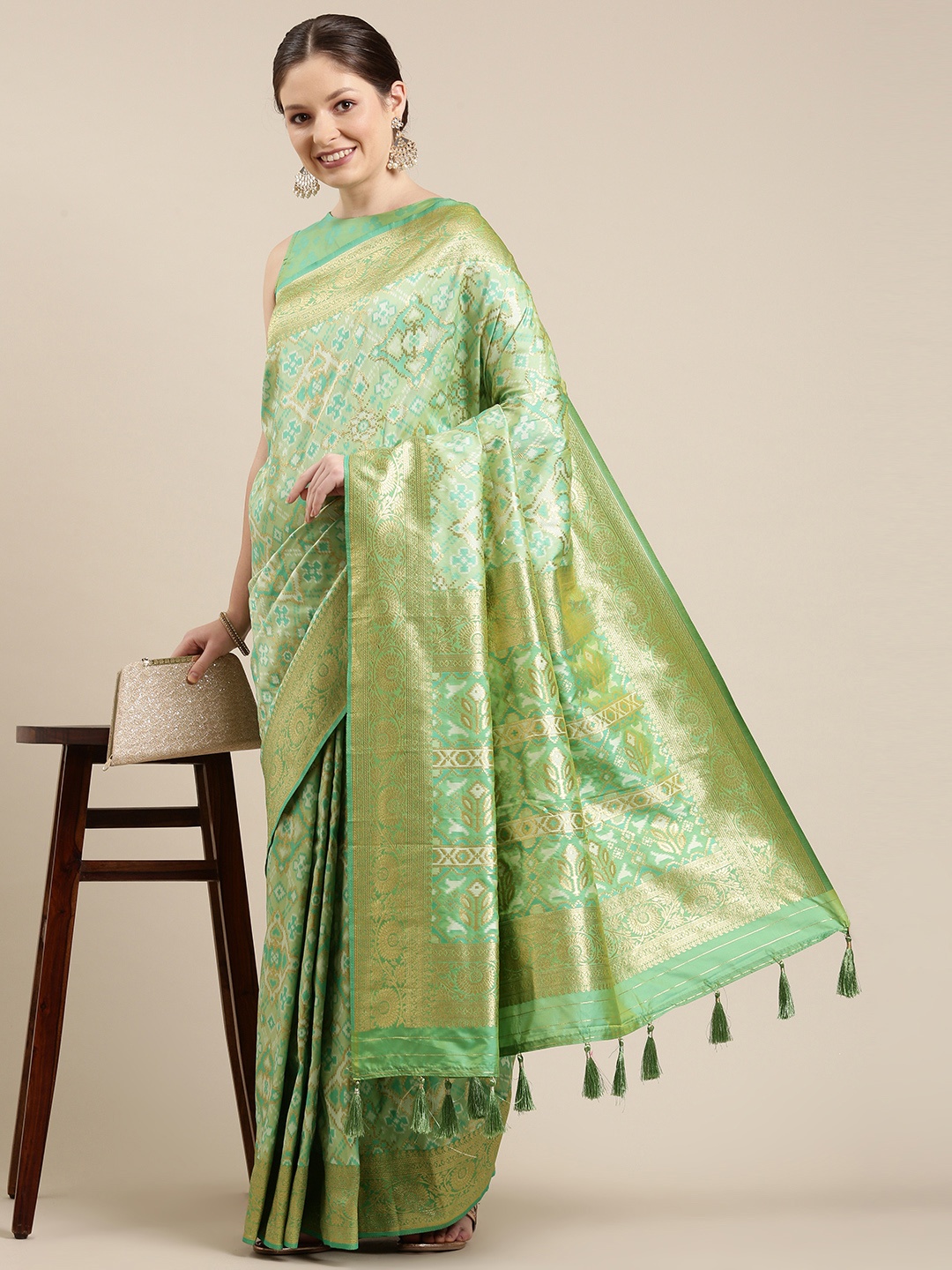 

panchhi Green & Golden Ethnic Motifs Zari Satin Banarasi Saree