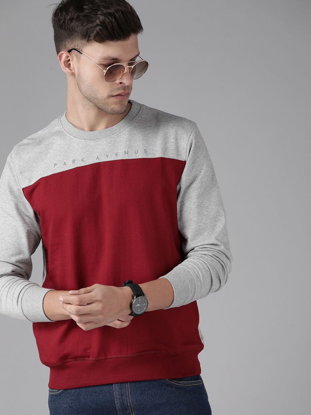 

Park Avenue Men Red & Grey Melange Colourblocked Sweatshirt