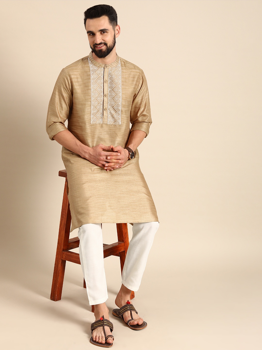 

Anouk Men Beige & White Yoke Design Thread Work Kurta with Pyjamas