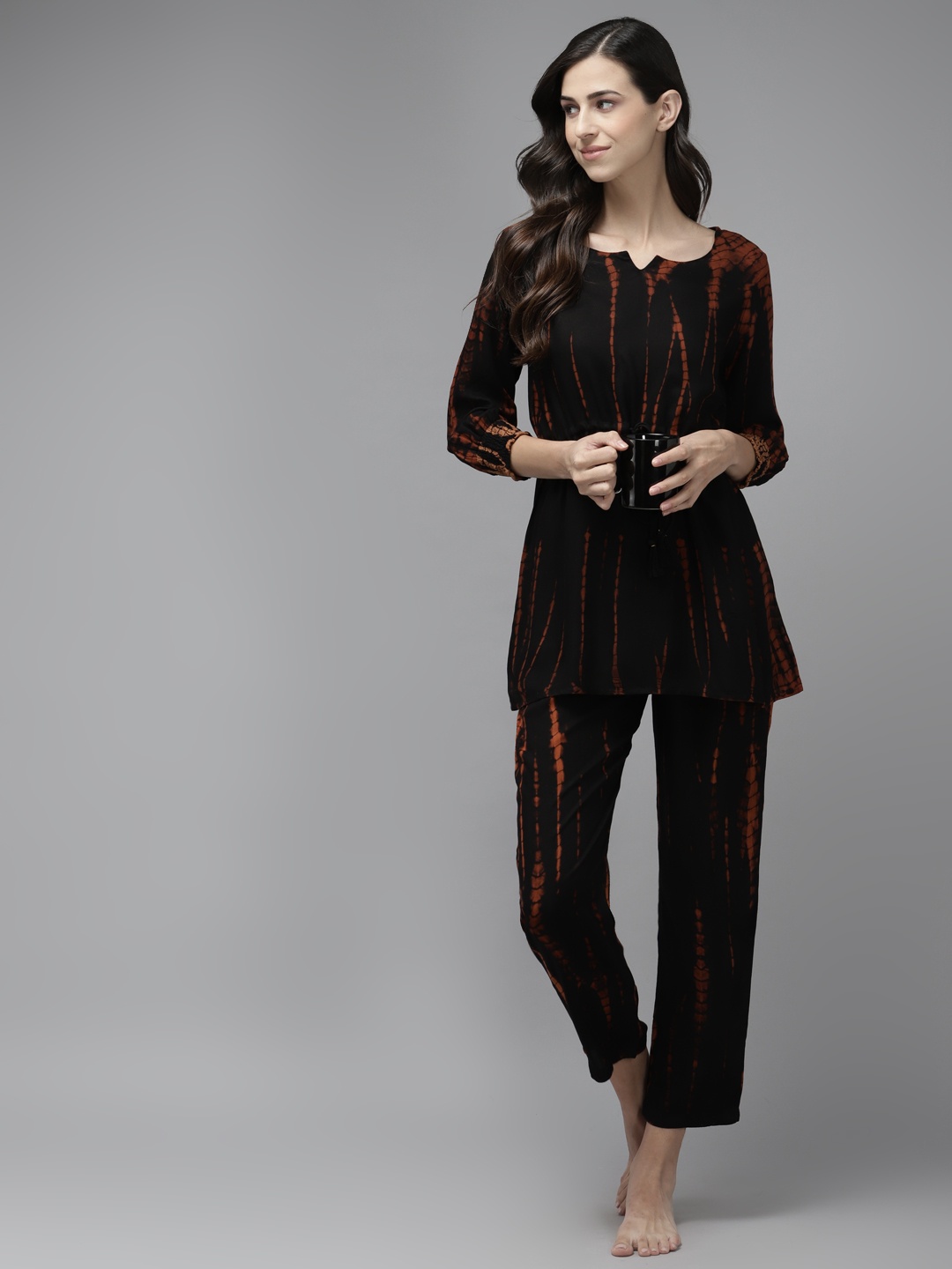 

Prakrti Women Black & Brown Printed Pyjama Set