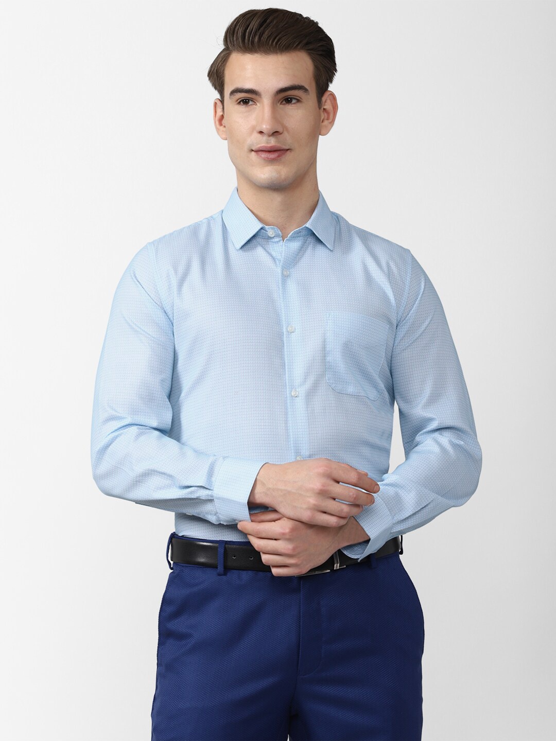 

Peter England Men Blue Solid Slim Fit Formal Shirt