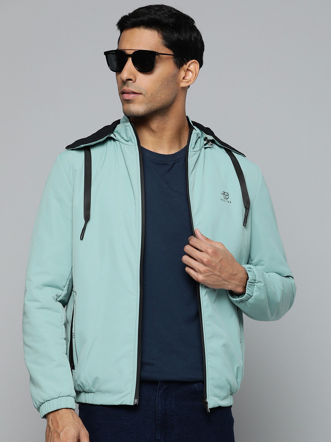 

Fort Collins Men Blue Solid Bomber Jacket With Detachable Hood