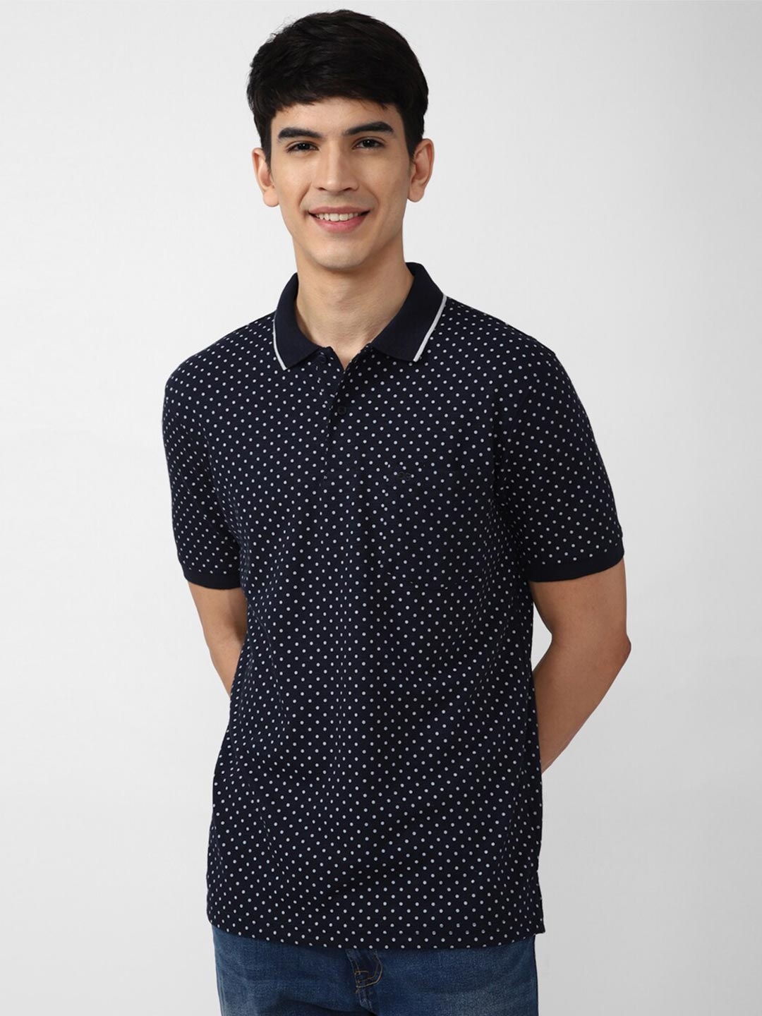 

Peter England Casuals Men Navy Blue Printed Polo Collar T-shirt