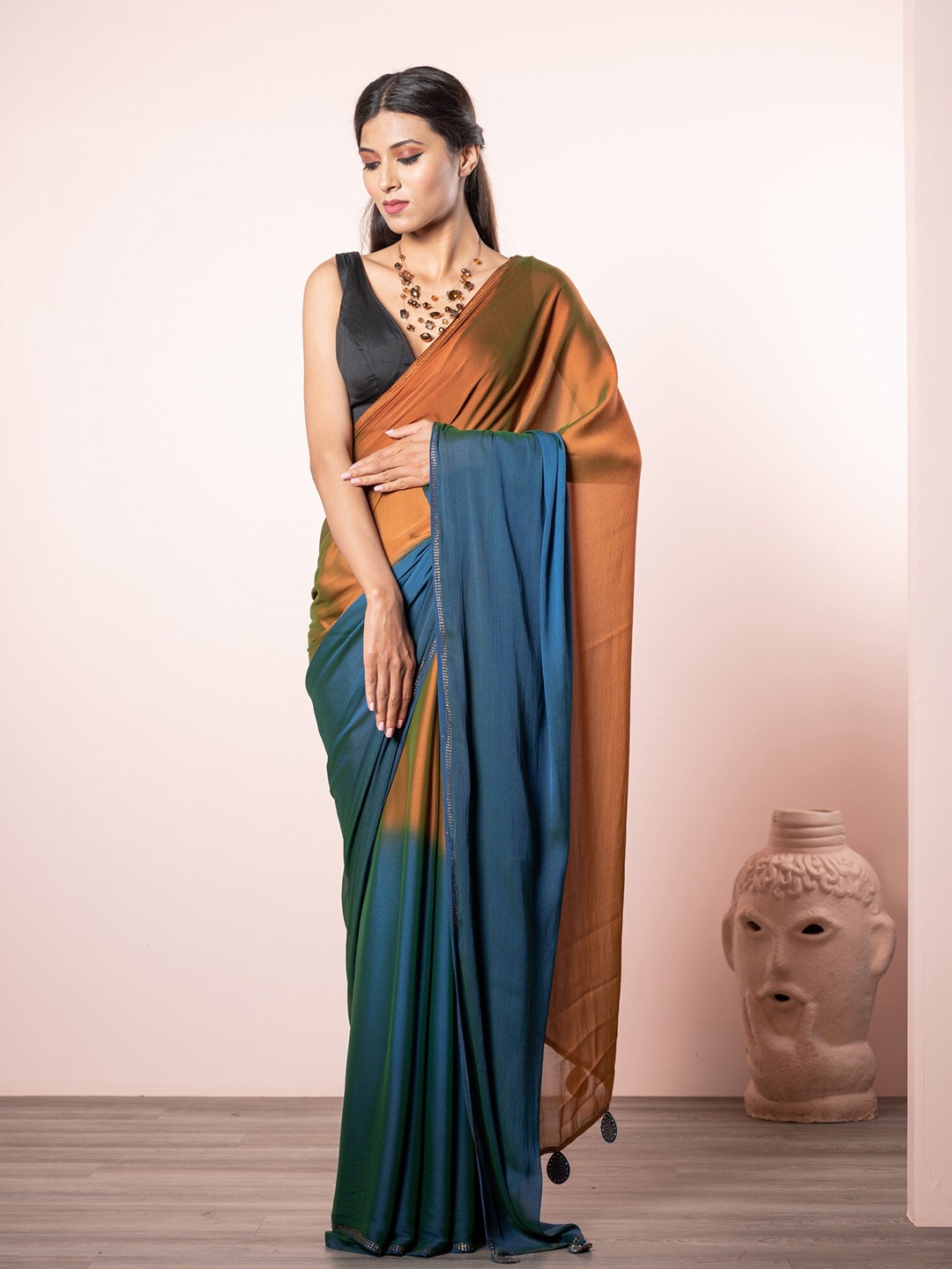 

Exclusiva Women Blue & Brown Ombre Poly Chiffon Saree