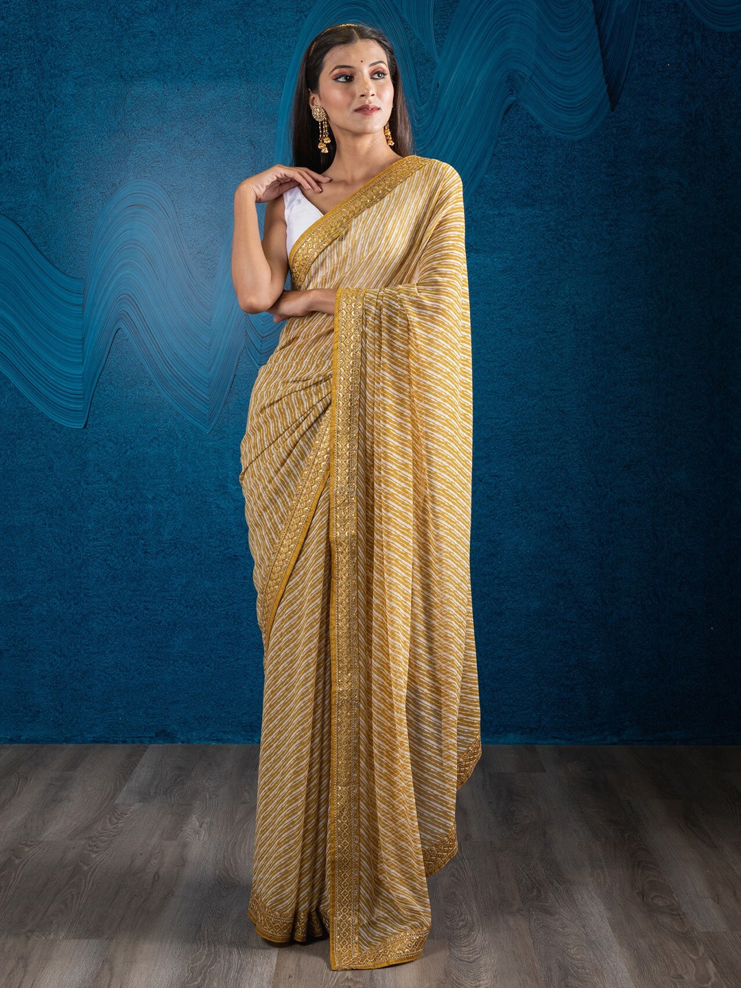 

Exclusiva Women Yellow Leheriya Embroidered Leheriya Saree