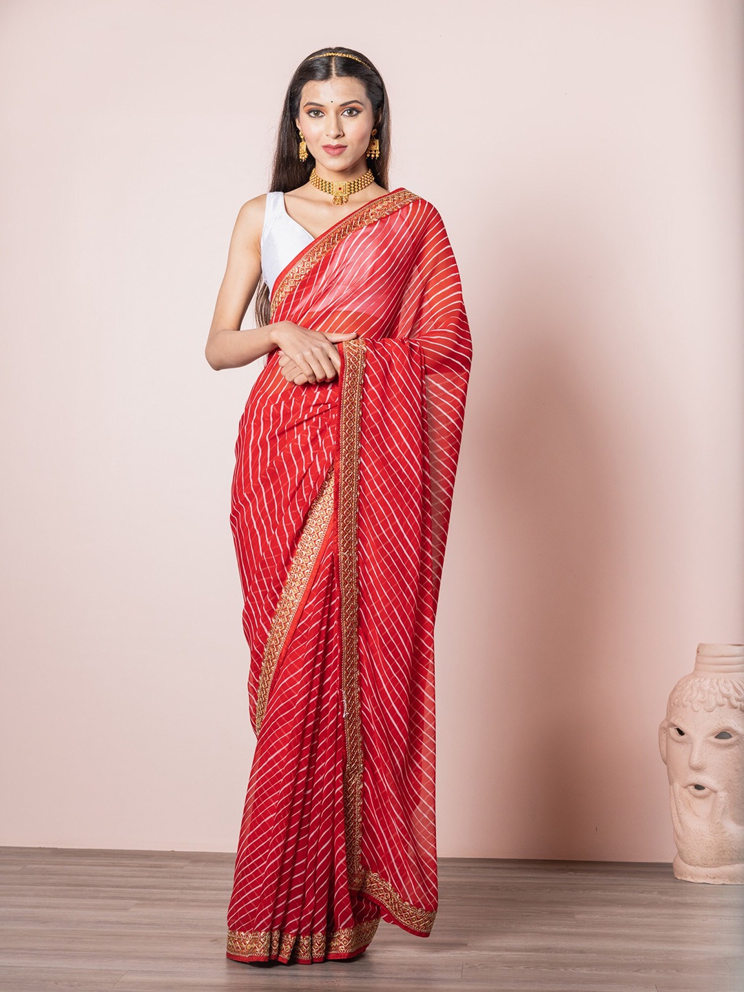 

Exclusiva Red & White Leheriya Saree