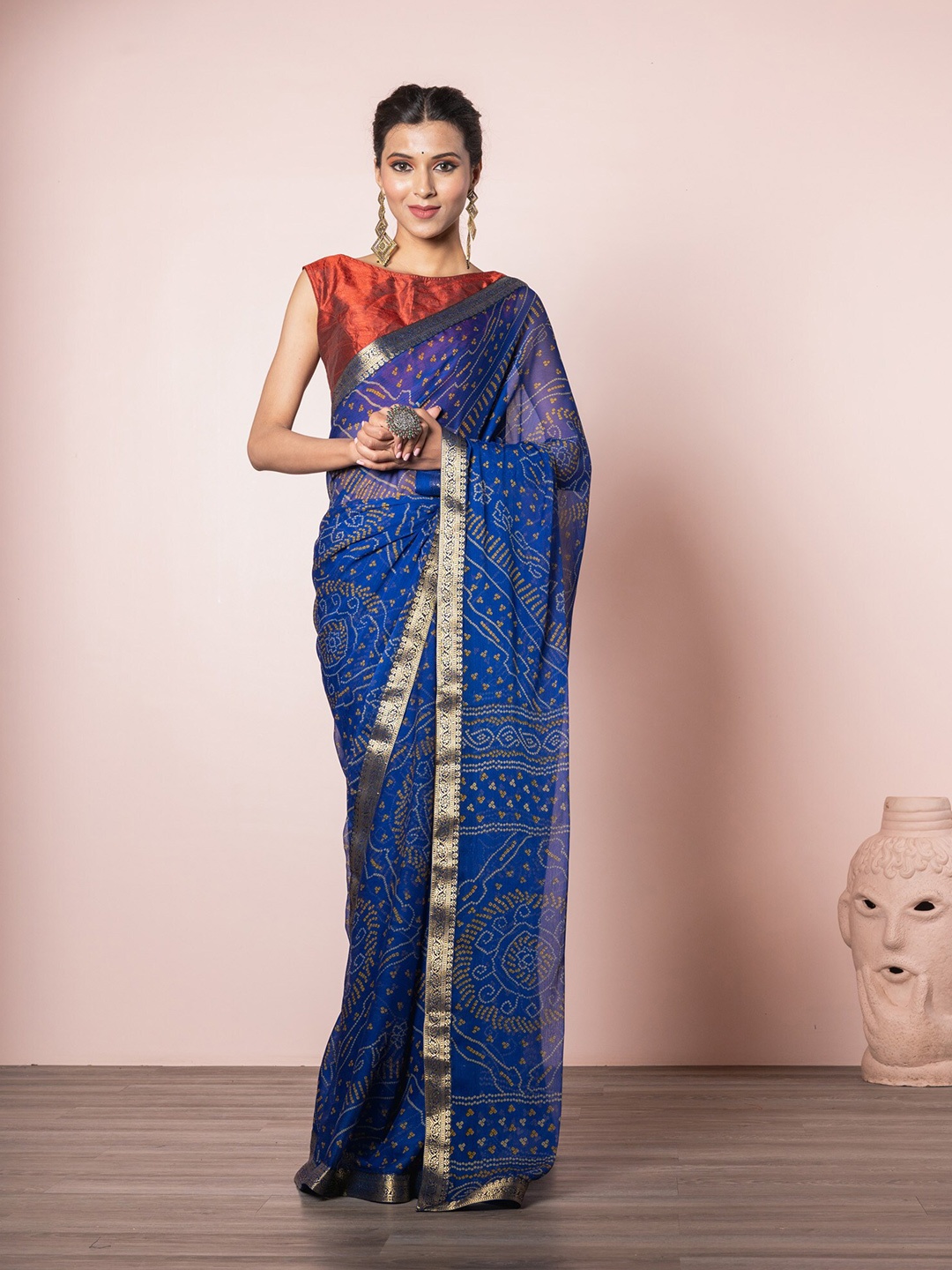 

Exclusiva Blue & Gold-Toned Bandhani Printed Chiffon Saree