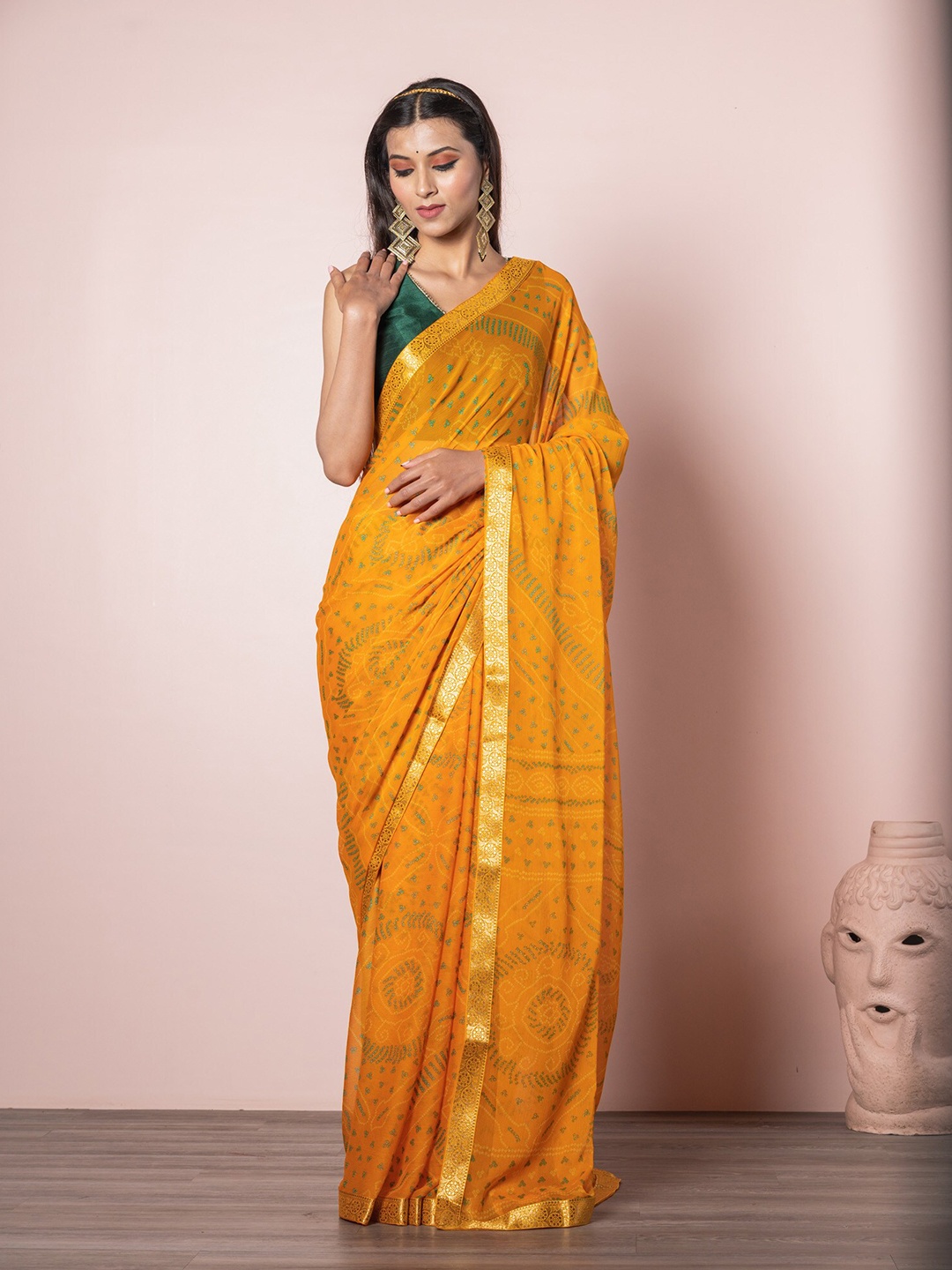 

Exclusiva Women Yellow & Gold-Toned Bandhani Print Zari Bandhani Saree