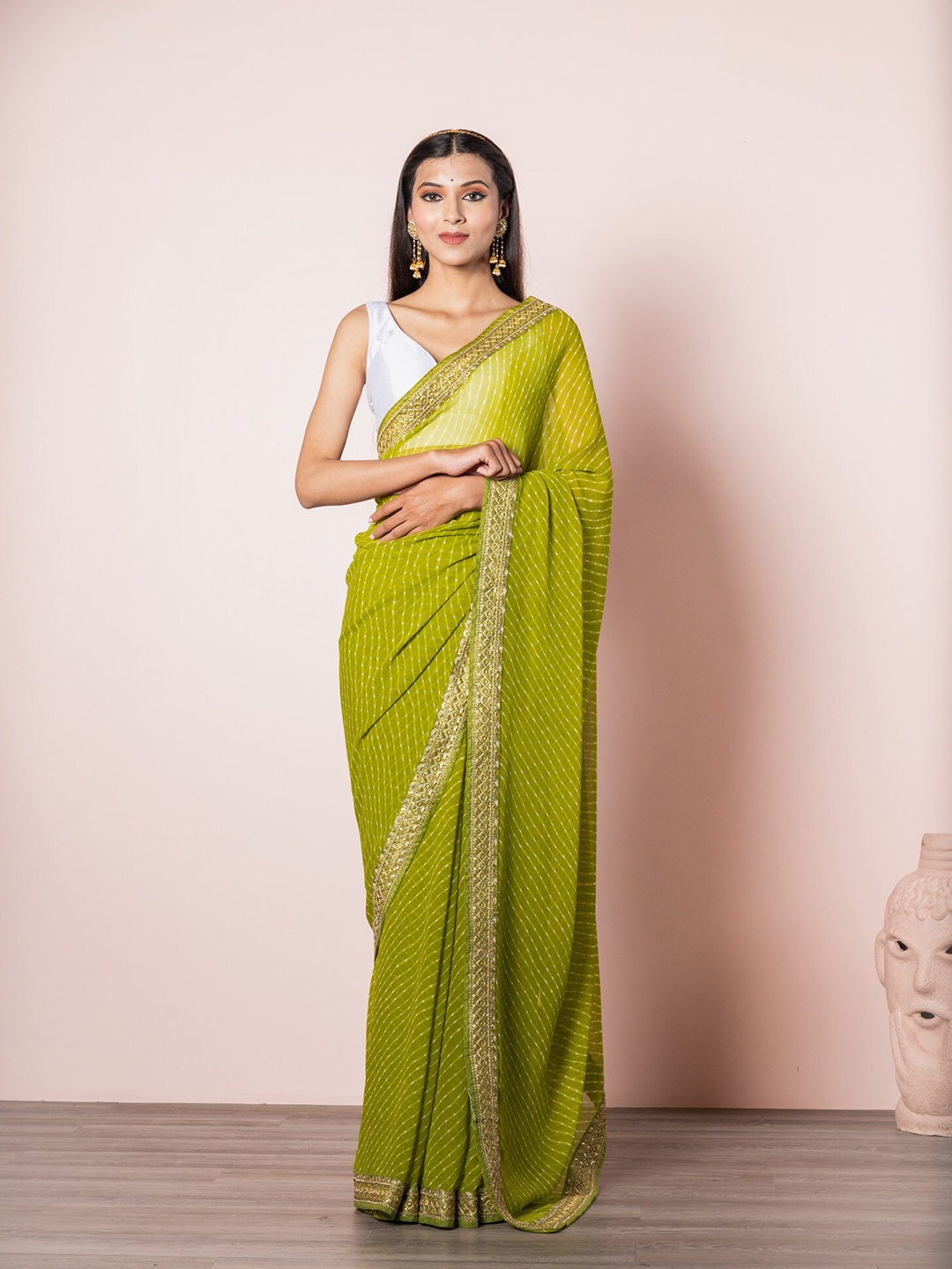 

Exclusiva Green & Gold-Toned Leheriya Printed Embroidered Saree