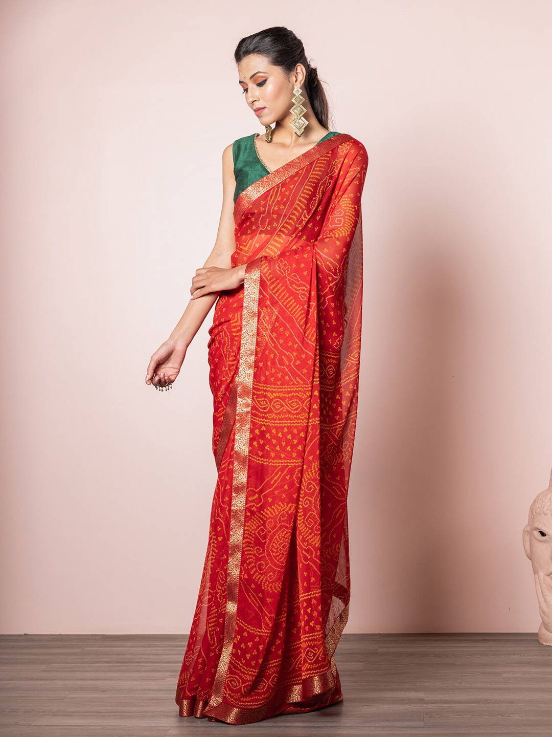 

Exclusiva Red & Gold-Toned Zari Border Bandhani Printed Saree