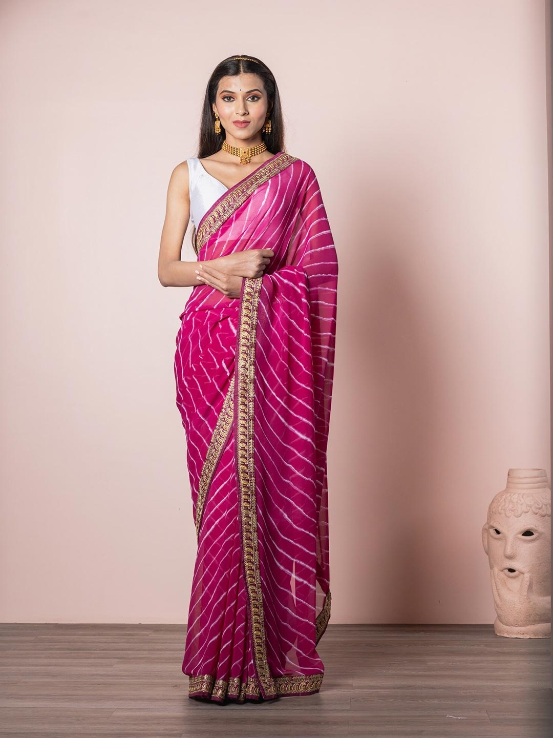 

Exclusiva Pink Leheriya Saree