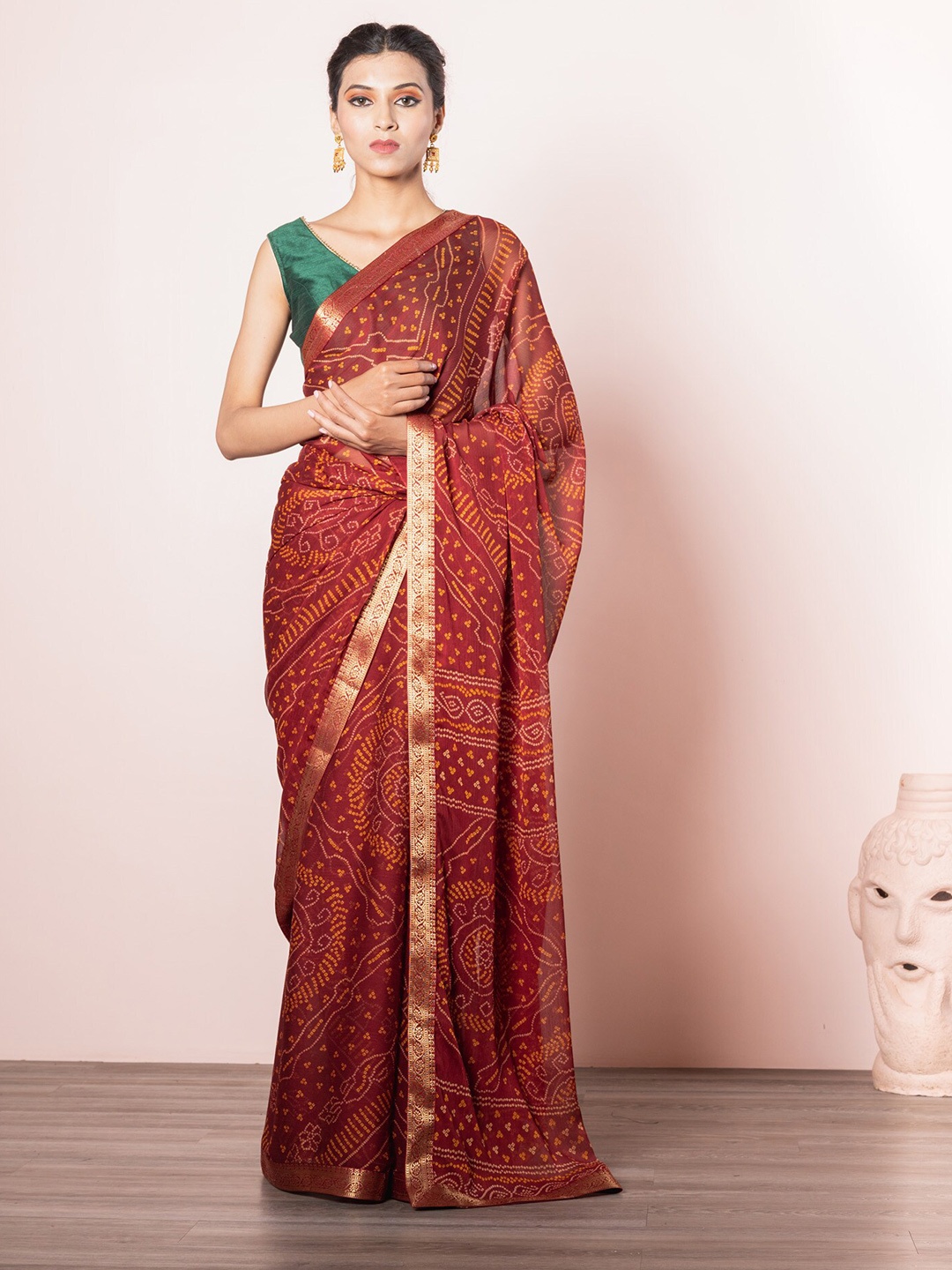 

Exclusiva Red & Yellow Ethnic Motifs Bandhani Print Saree with Zari Border