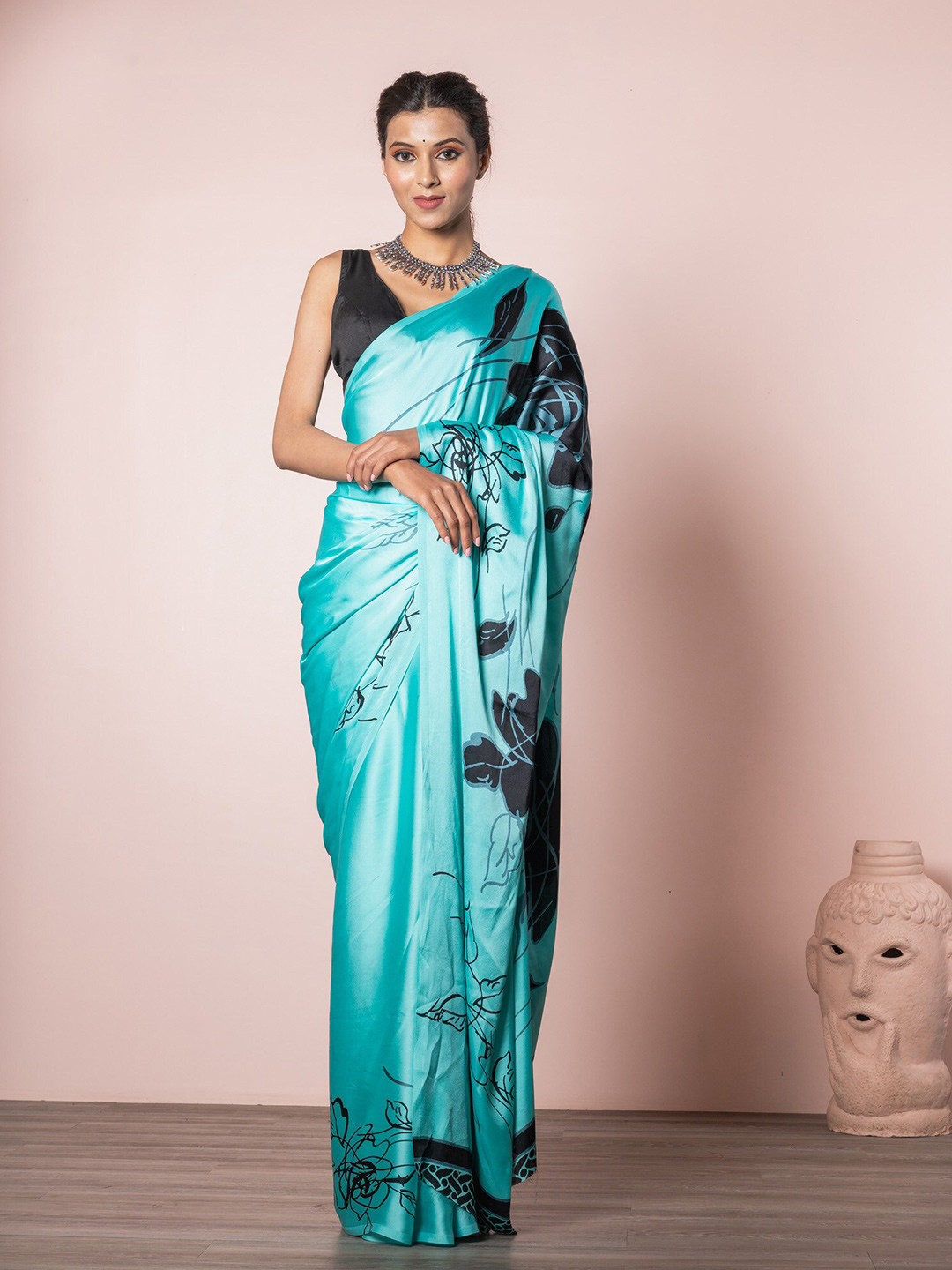 

Exclusiva Blue & Black Floral Saree