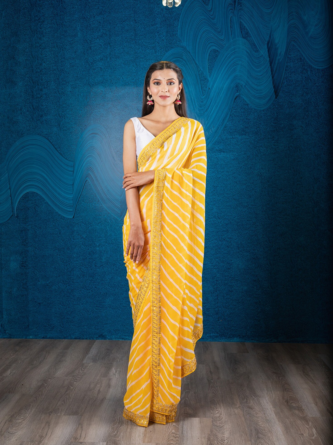 

Exclusiva Yellow & White Leheriya Embroidered Leheriya Saree