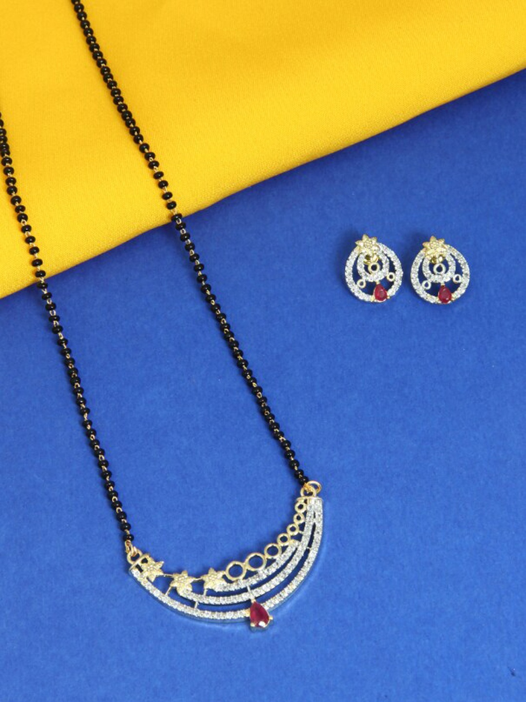 

FEMMIBELLA Gold-Plated Black & White Stone Studded & Beaded Mangalsutra Set