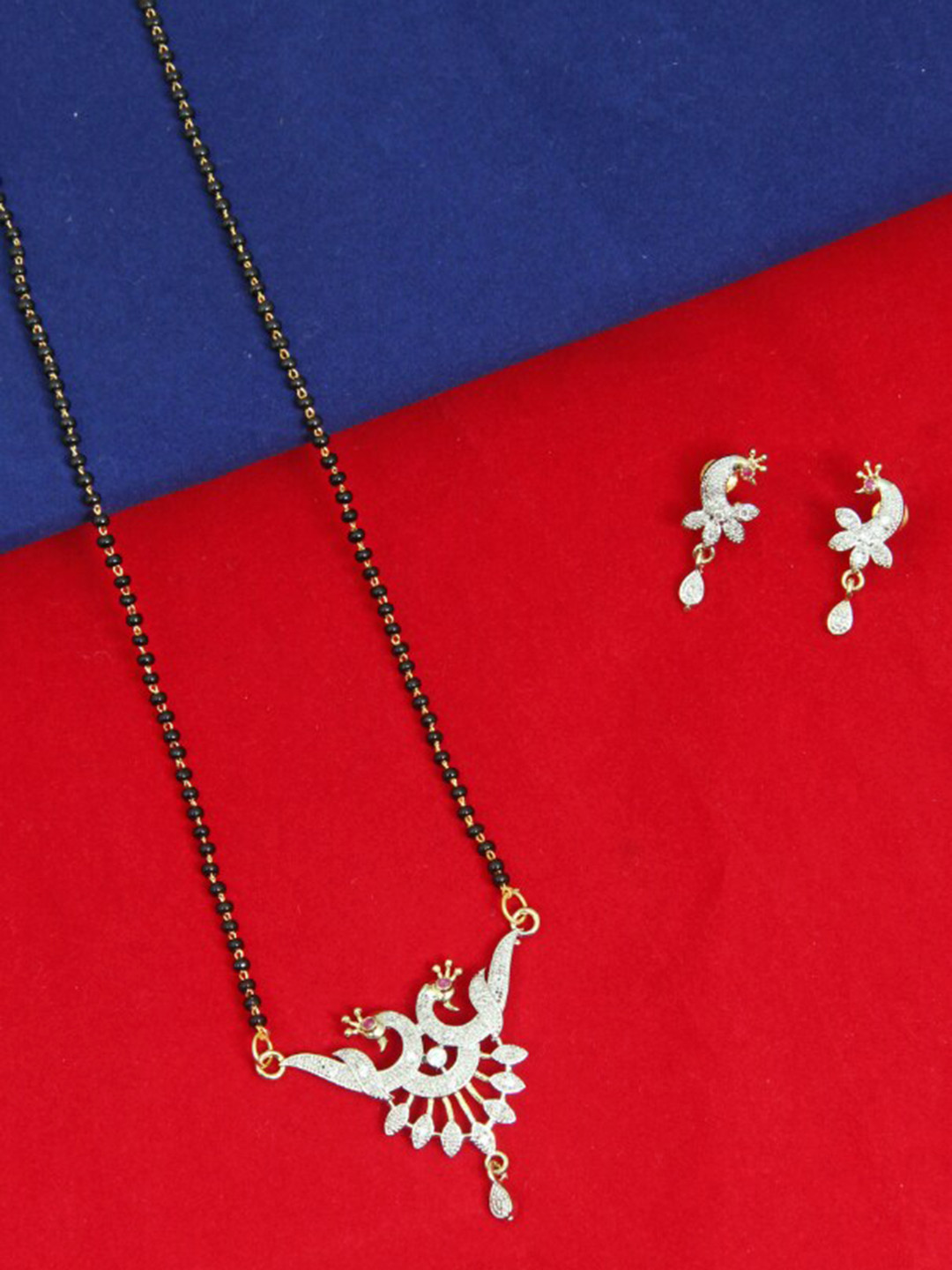 

FEMMIBELLA Gold-Plated Gold-Toned Black Stone Studded Peacock Mangalsutra