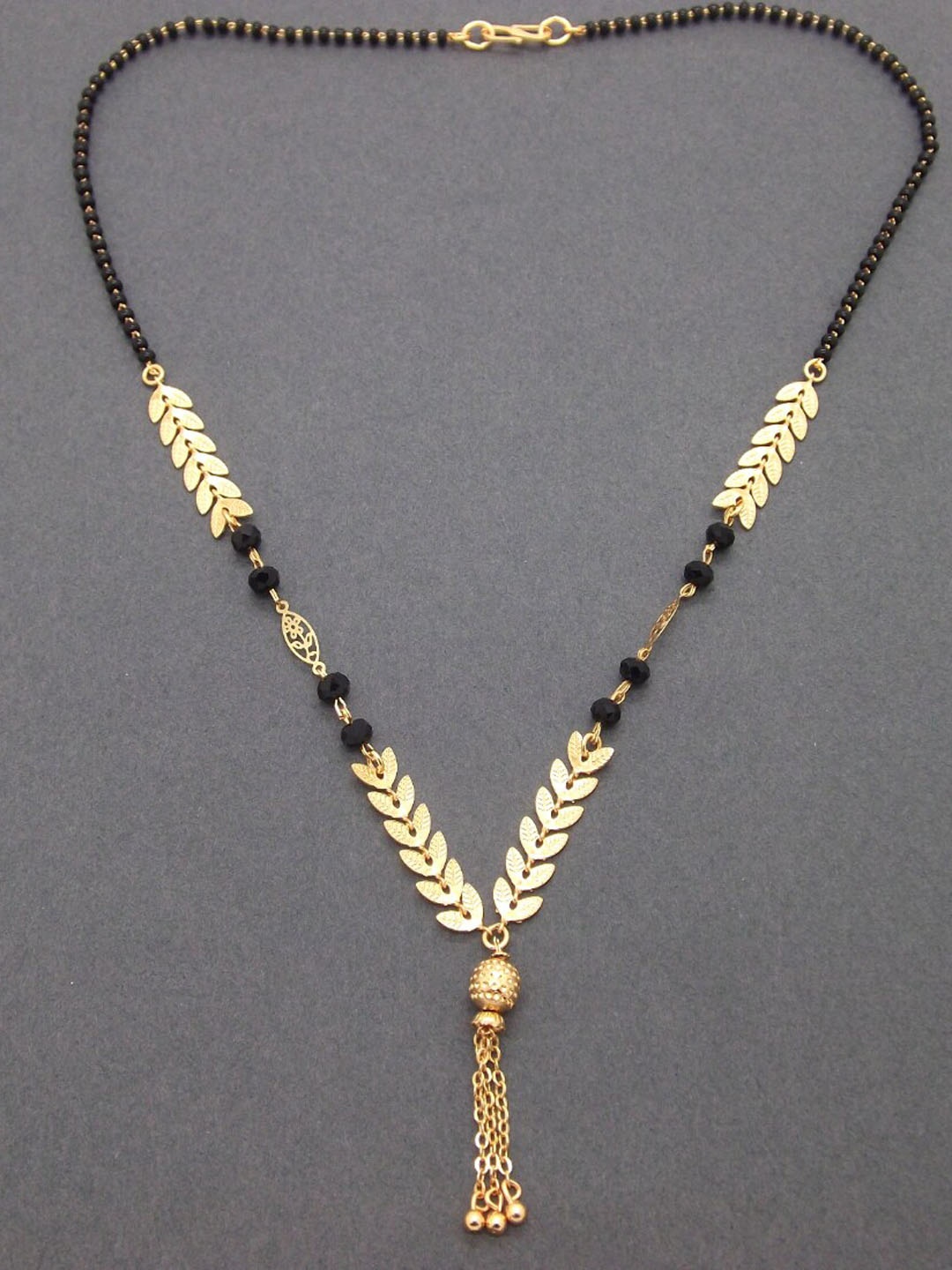 

FEMMIBELLA Gold-Plated & Black Beaded Mangalsutra