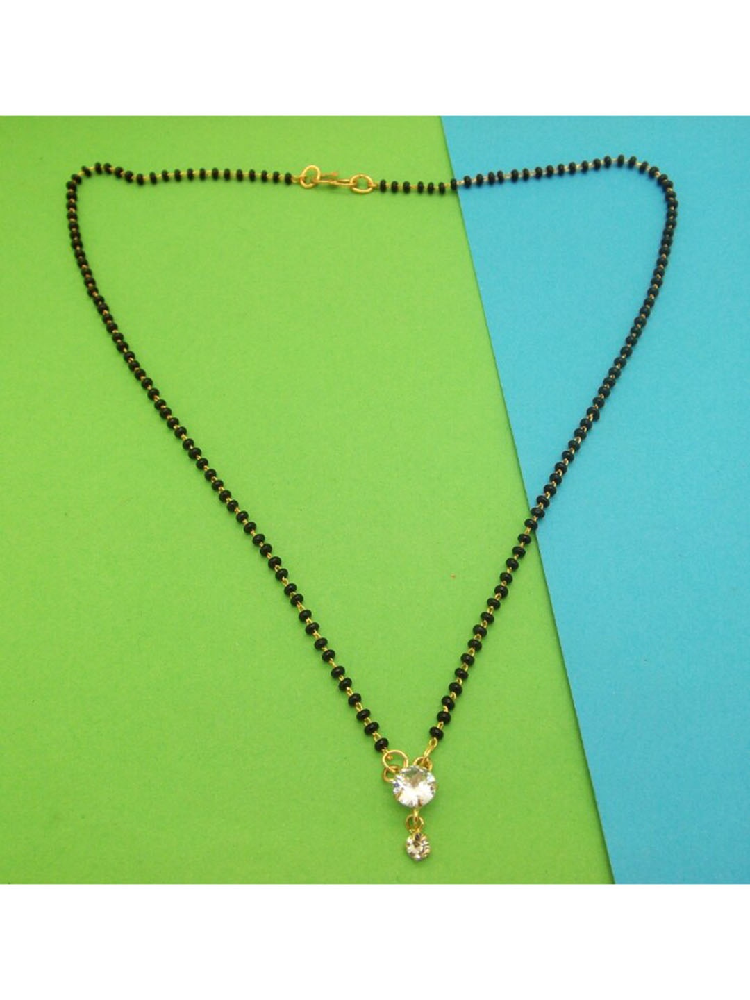 

FEMMIBELLA Gold-Plated Black & White Stone-Studded & Beaded Mangalsutra