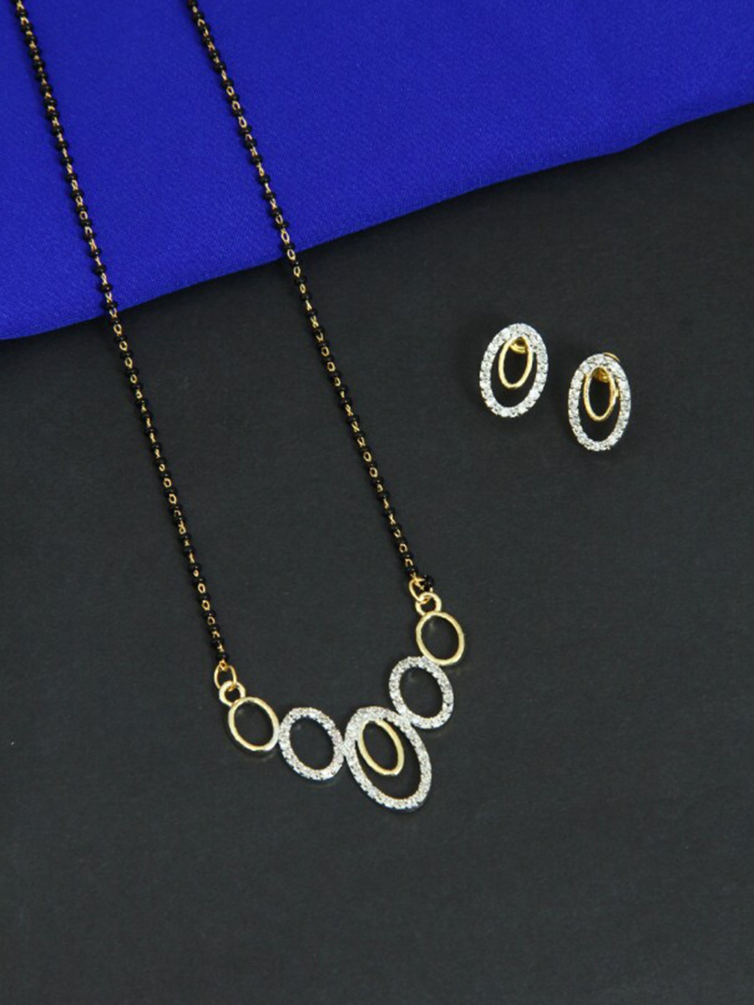 FEMMIBELLA Gold-Plated & Black Beaded & AD-Studded Mangalsutra