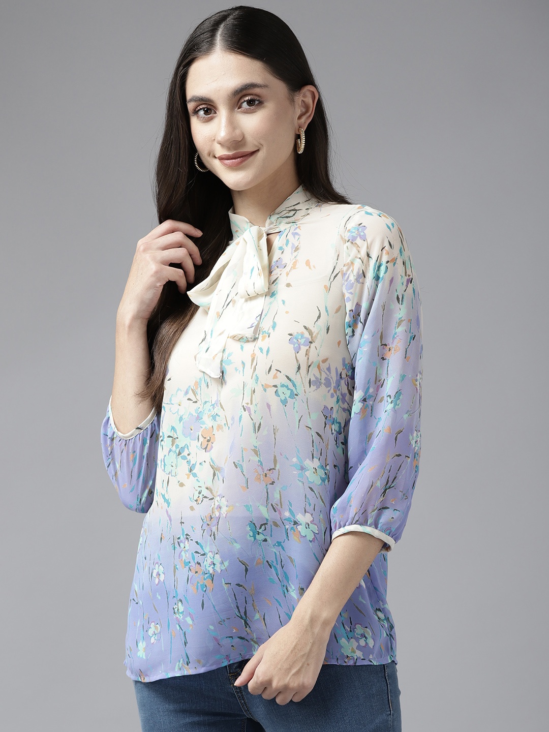 

Aarika Cream-Coloured & Blue Floral Print Tie-Up Neck Georgette Top