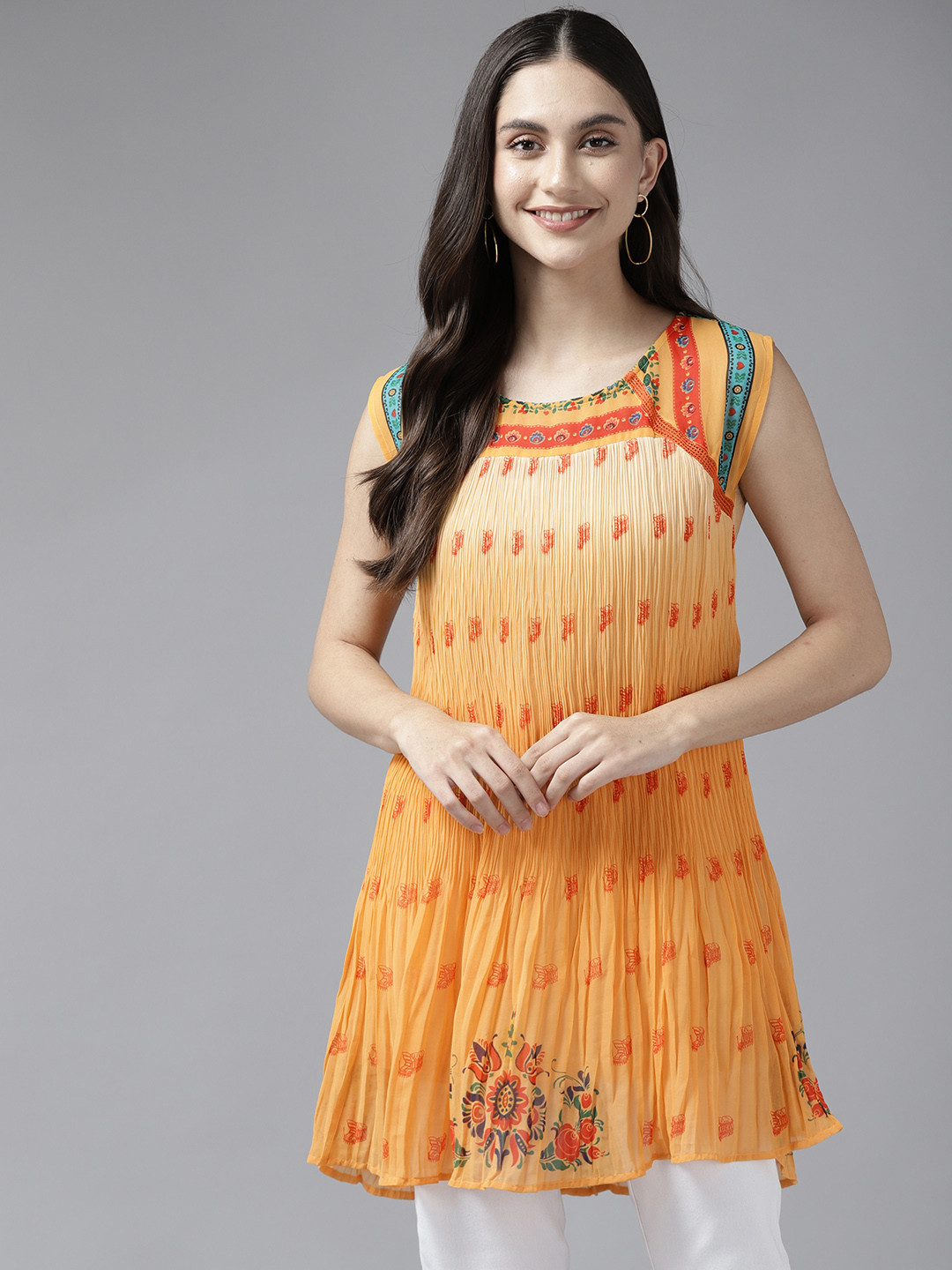 

Aarika Orange & Red Print Georgette Longline Top
