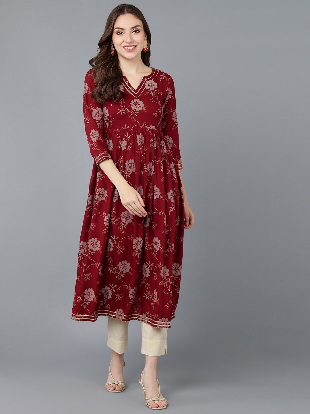 

AHIKA Women Maroon Ethnic Motifs Printed Flared Sleeves Gotta Patti Kurta