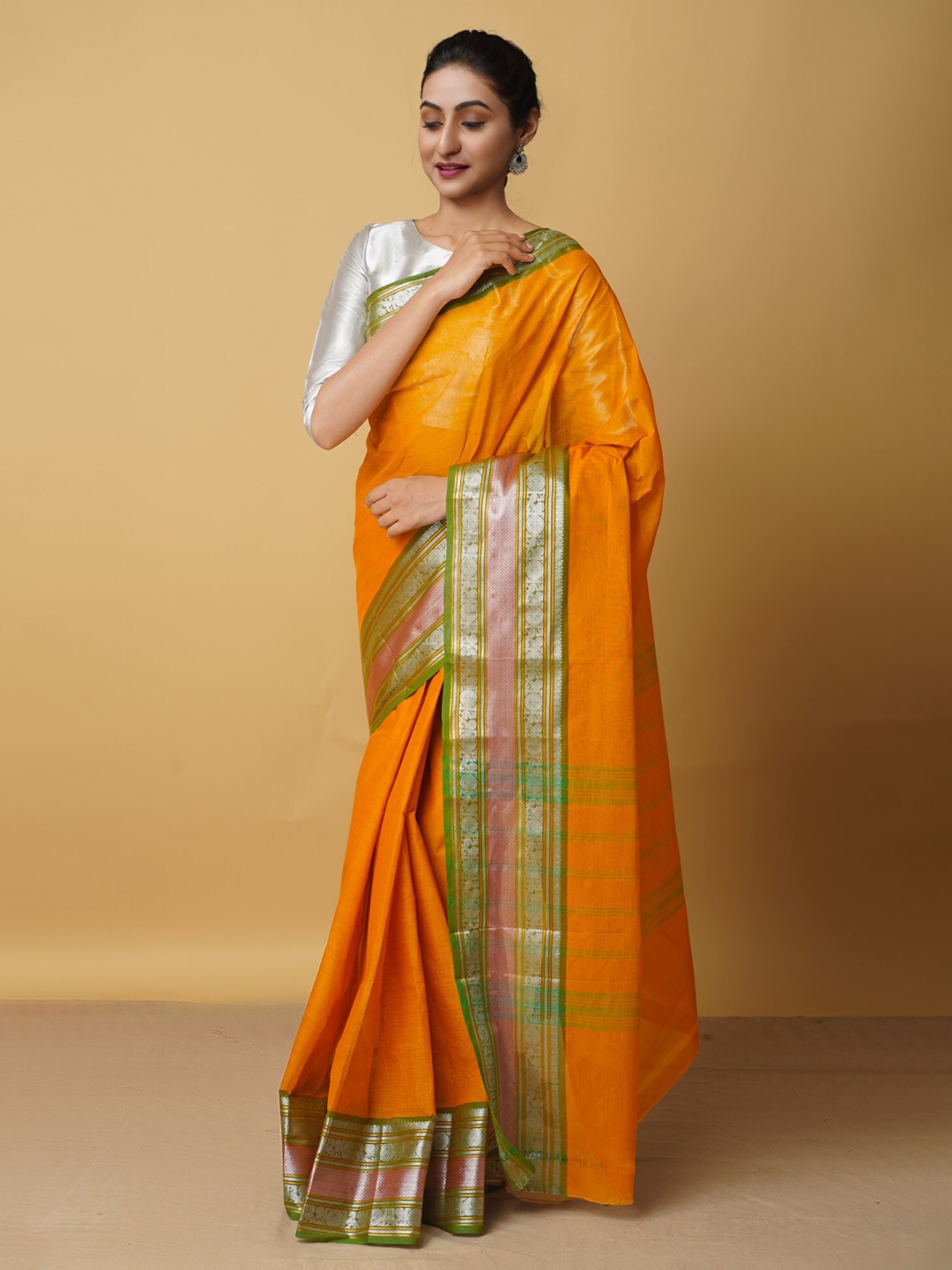 

Unnati Silks Orange & Green Zari Pure Cotton Chettinad Saree