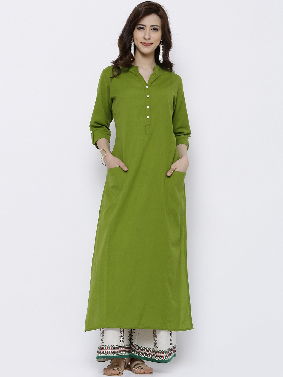 

Vishudh Women Green Solid Straight Kurta