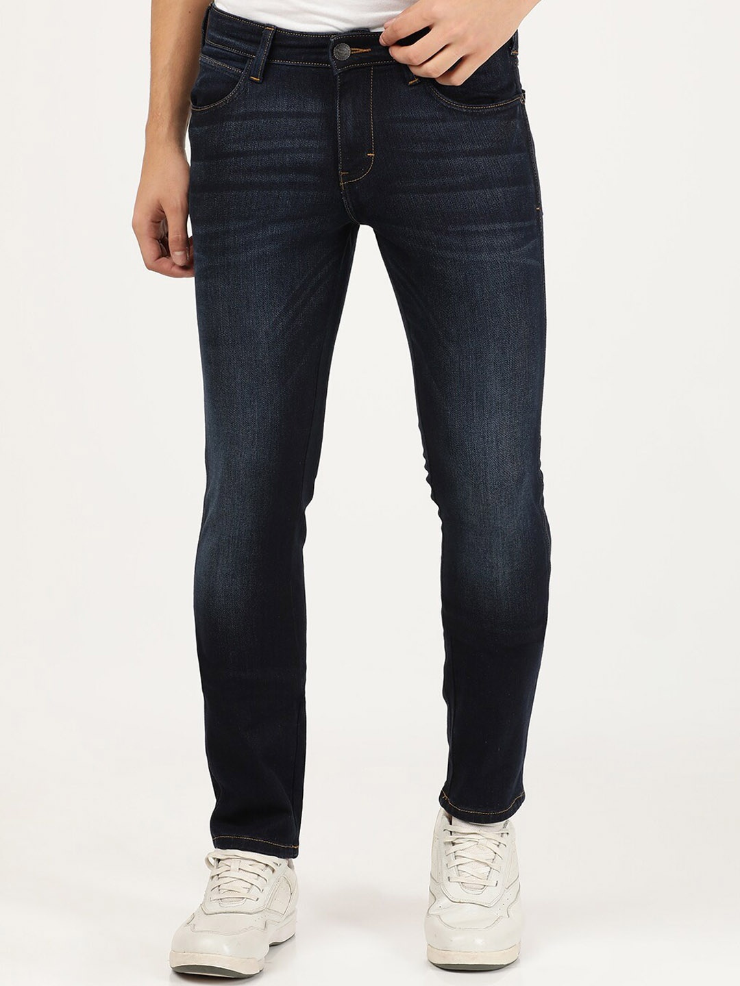 

Wrangler Men Blue Skanders Slim Fit Low-Rise Low Distress Light Fade Stretchable Jeans