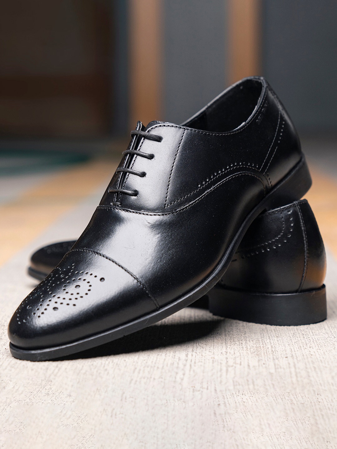 

Red Tape Men Black Solid Leather Formal Derbys