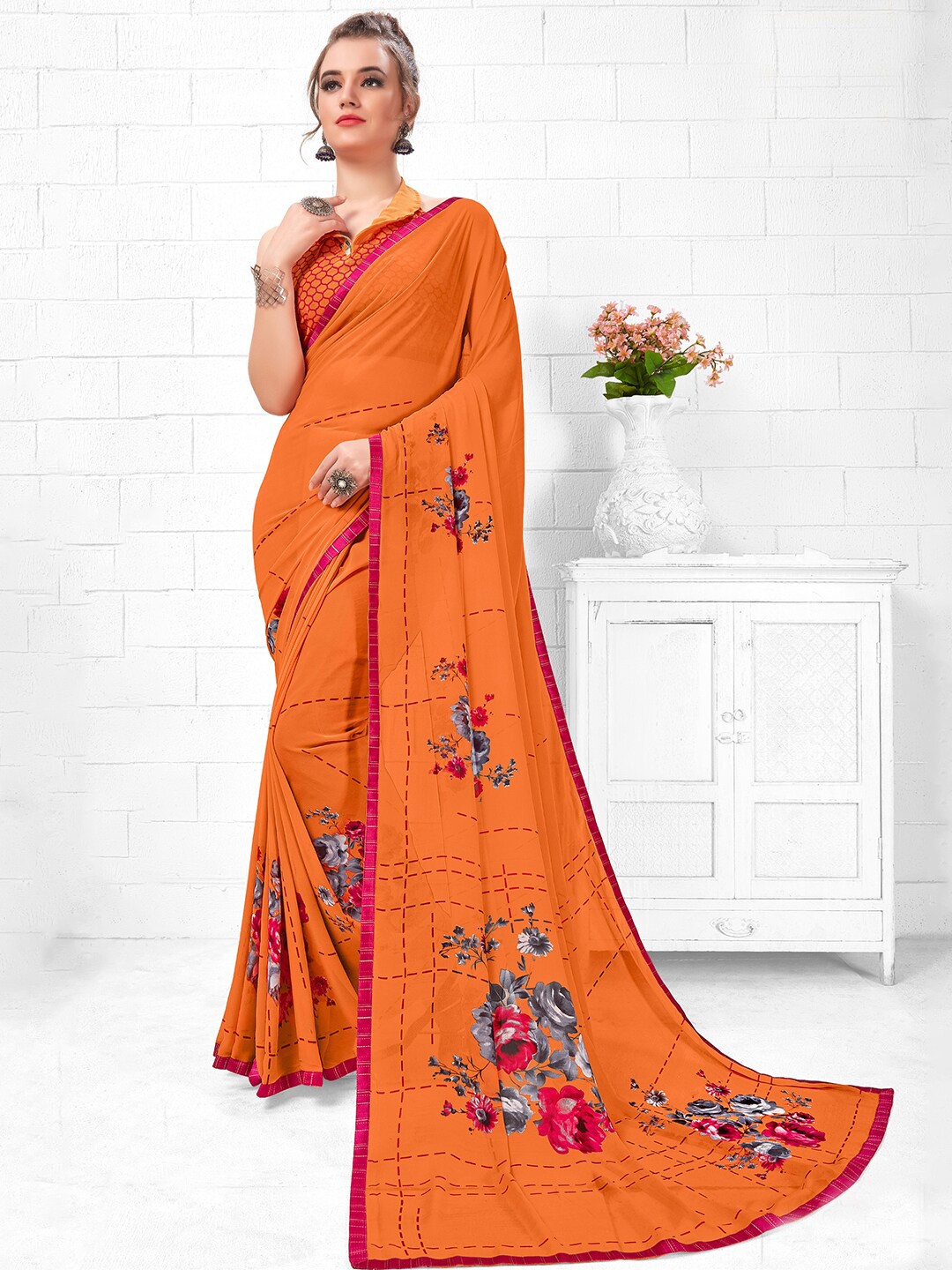 

Shaily Women Orange & Red Floral Saree