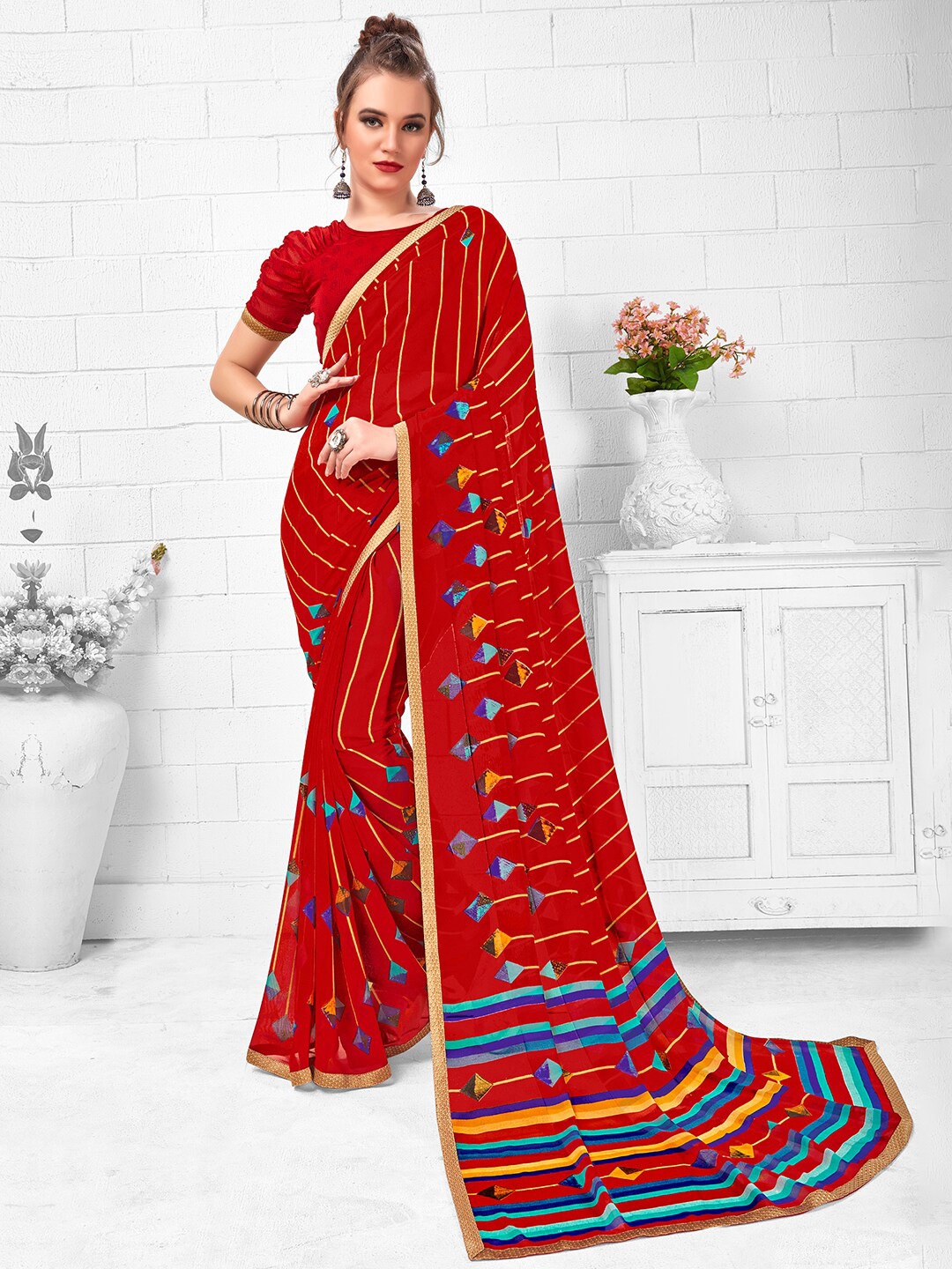 

Shaily Red & Blue Striped Print Poly Georgette Saree
