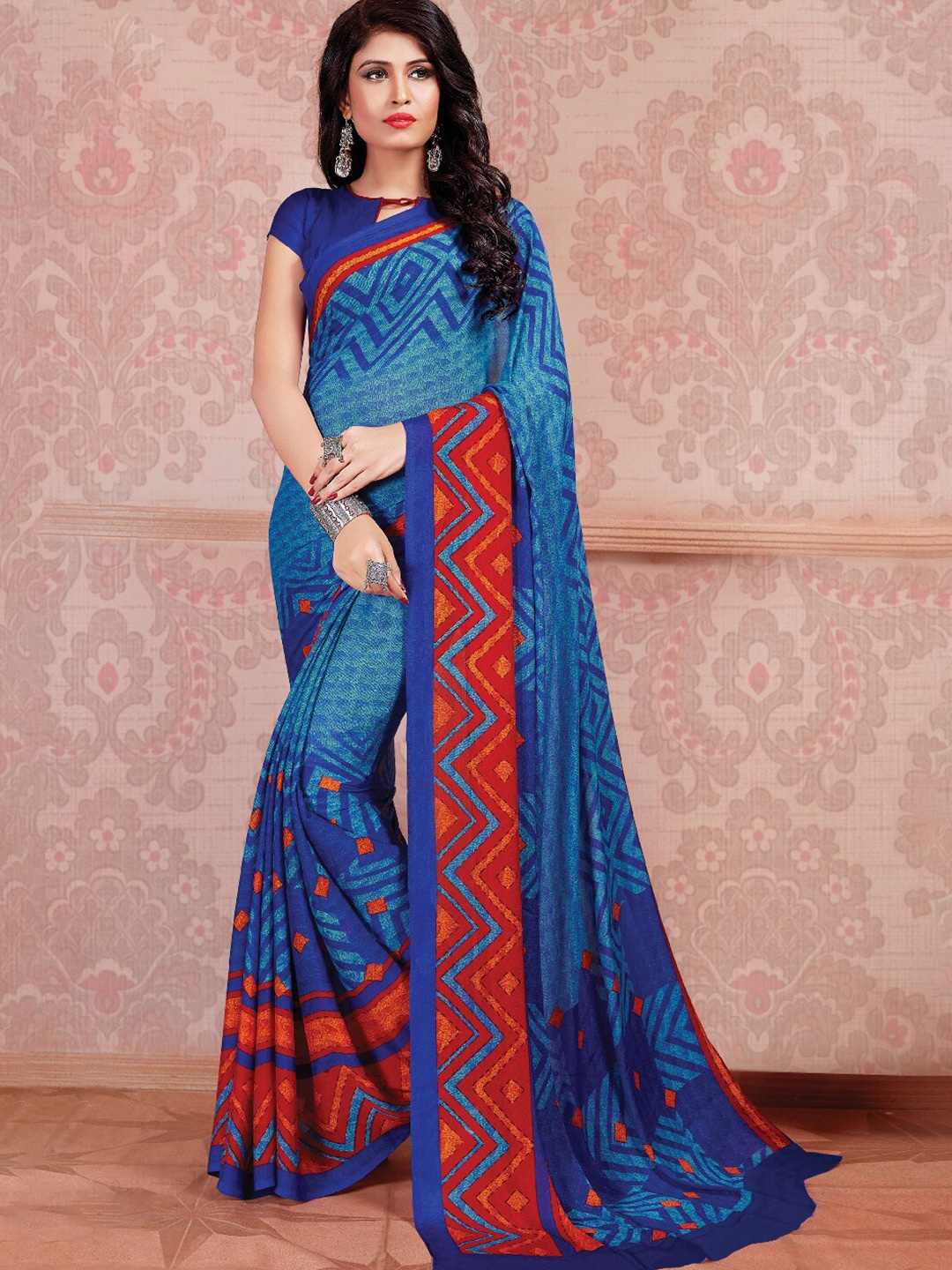 

Shaily Women Blue & Red Geometric Printed Poly Georgette Saree