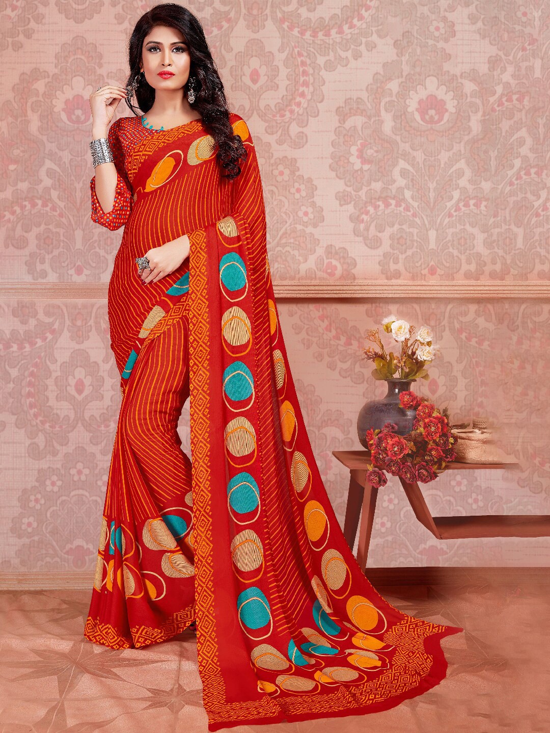 

Shaily Women Red & Beige Printed Poly Georgette Saree