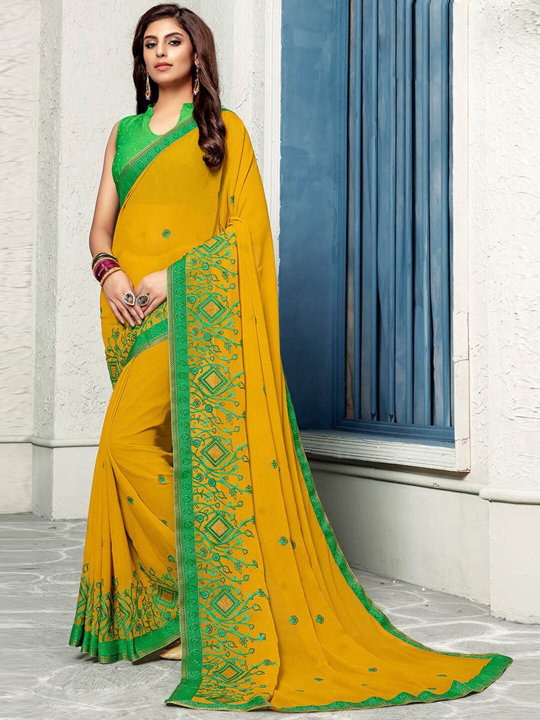 

Shaily Mustard & Green Floral Embroidered Pure Chiffon Saree