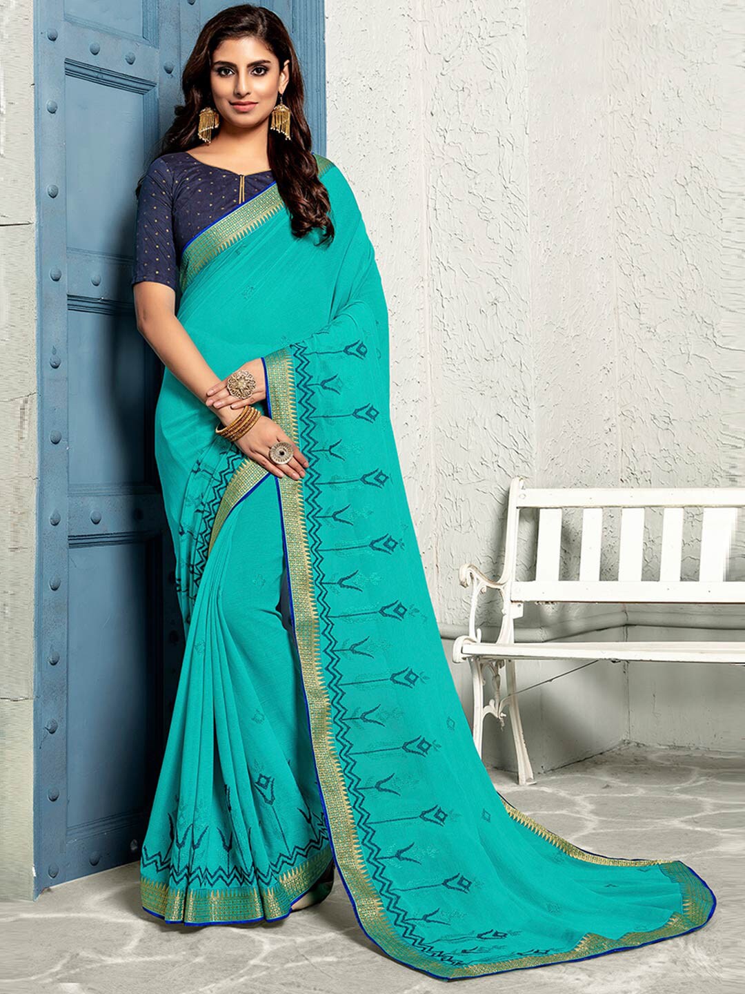 

Shaily Women Turquoise Blue & Gold-Toned Floral Embroidered Pure Chiffon Saree