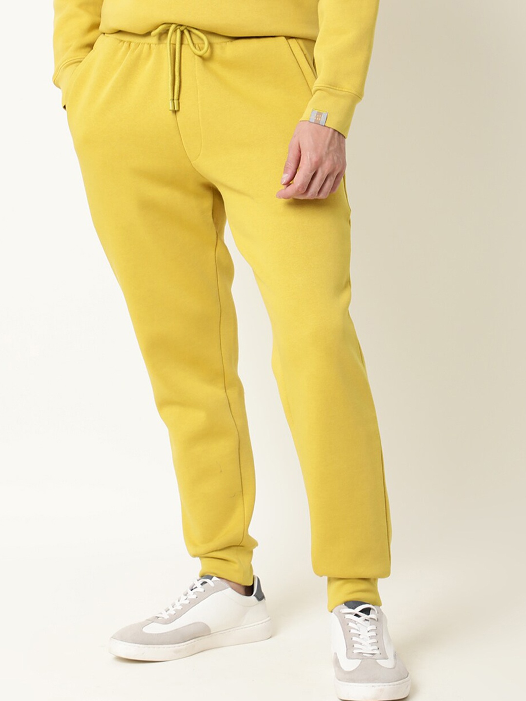 

RARE RABBIT Men Chase Slim Fit Solid Cotton Joggers, Mustard