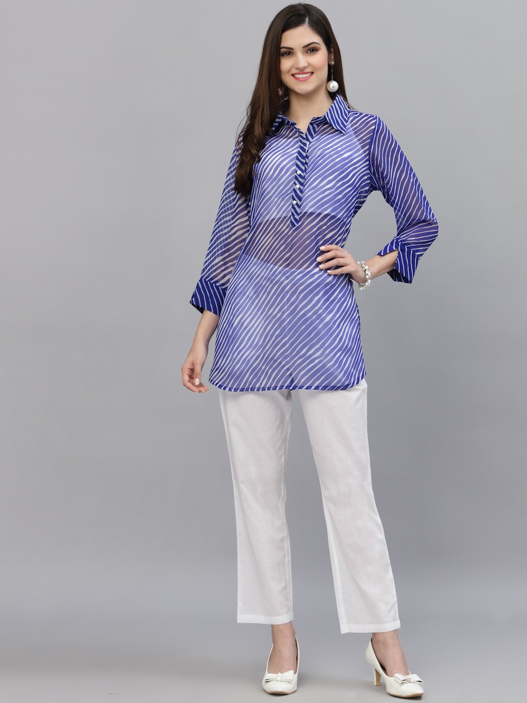 

Ragavi Women Blue Leheriya Kurti with Trousers