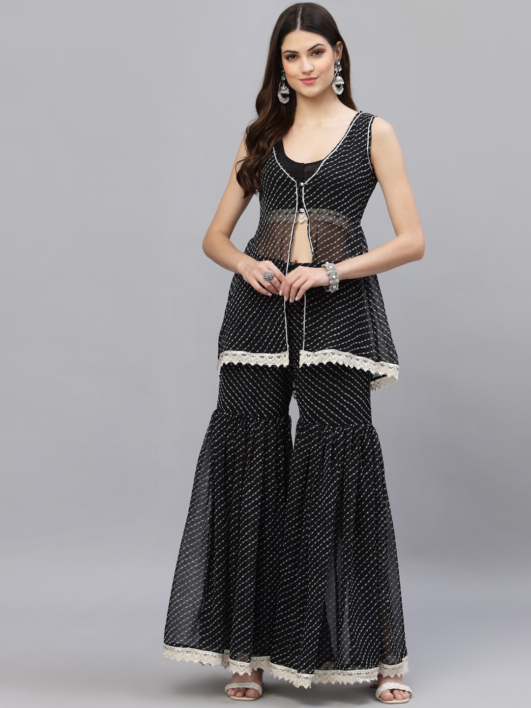 

Ragavi Women Black Printed Tiered Kurti with Sharara